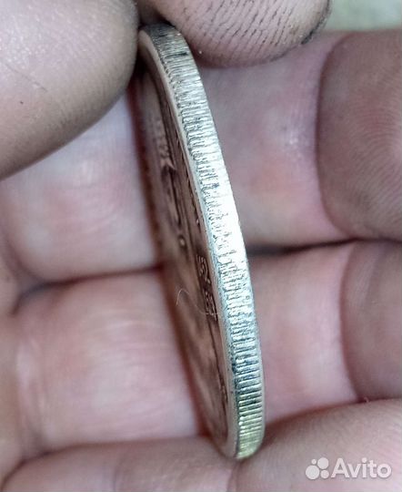 Монета Да Винчи