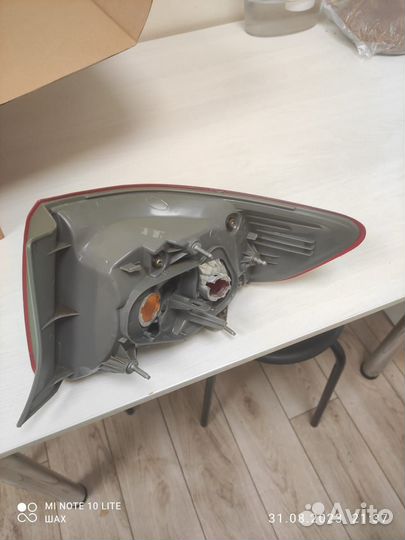 Фонарь задний левый внешний Toyota Corolla150 2008