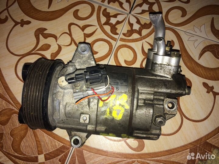 Компрессор кондиционера Nissan 92600Ew600