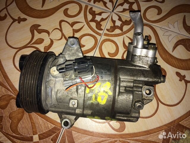 Компрессор кондиционера Nissan 92600Ew600
