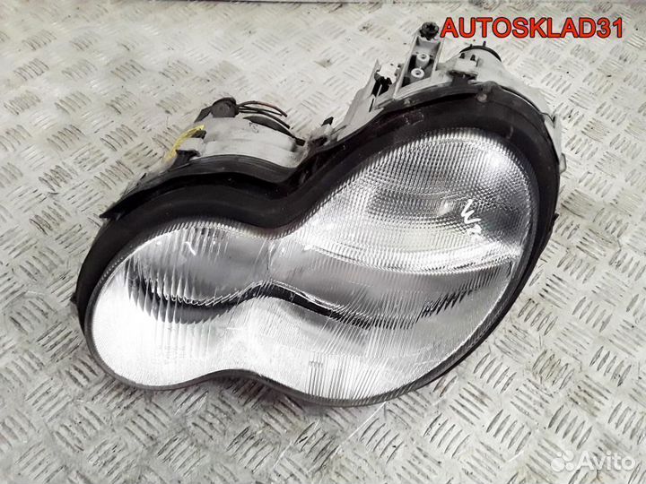 Фара левая Mercedes Benz W203 0301166201