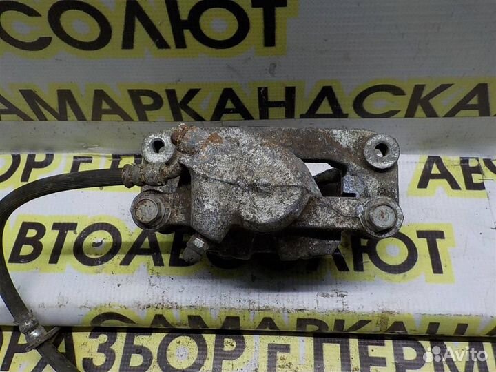 Суппорт задний левый Subaru Impreza III (GE/GH/GR