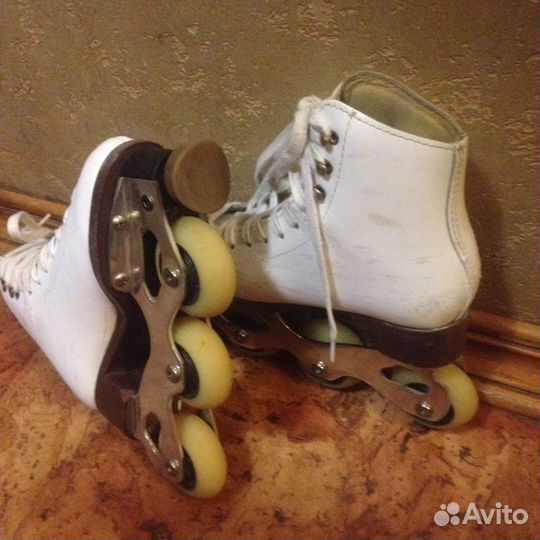 Роликовые коньки