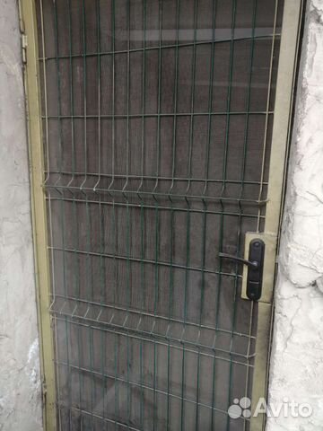 Дверь решетчатая металлическая