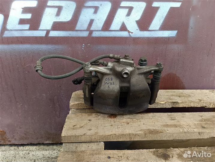 Суппорт тормозной передний правый Volkswagen