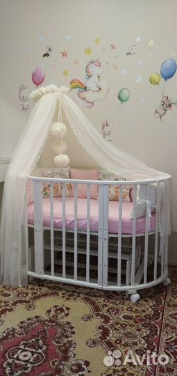 Детская кроватка с продольным маятником