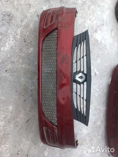 Бампер передний решетка радиатора Renault Logan 1