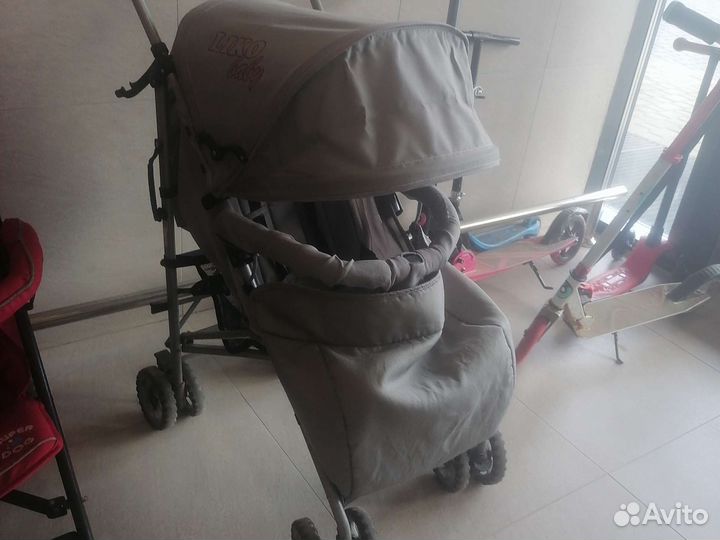 Коляска трость