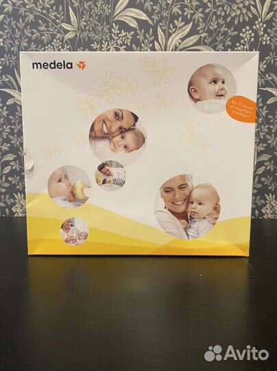 Молокоотсос medela