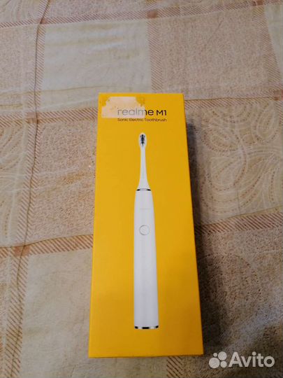 Электронная зубная щетка