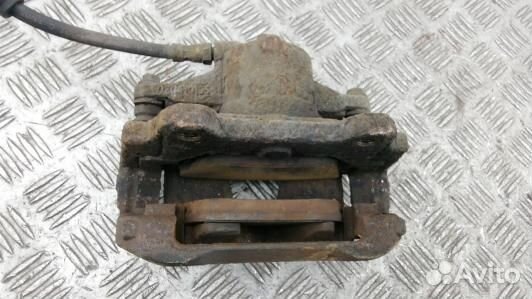 Суппорт тормозной передний левый opel corsa D (91O