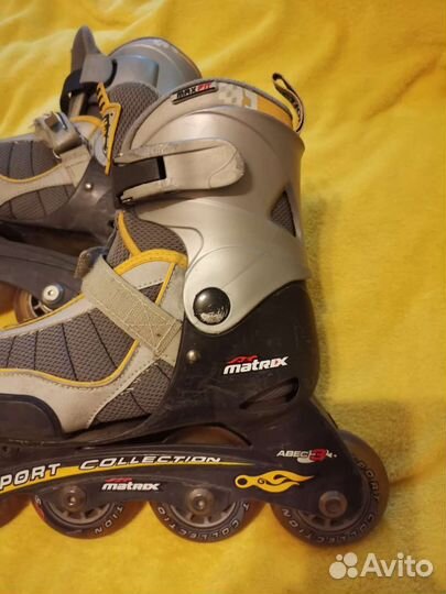 Роликовые коньки