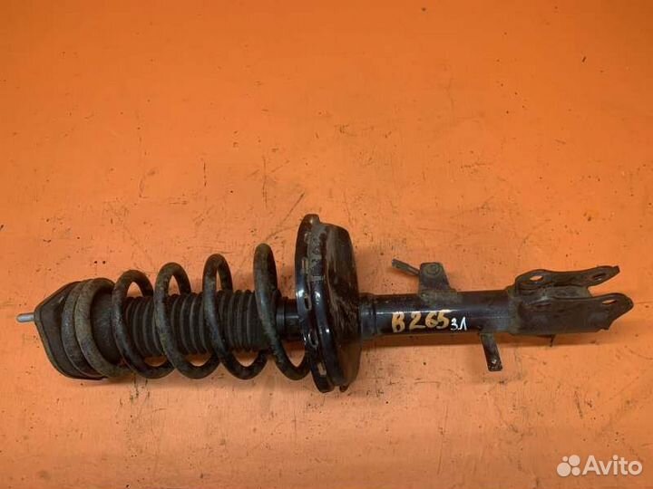 Стойка амортизатора задняя левая Toyota Highlander