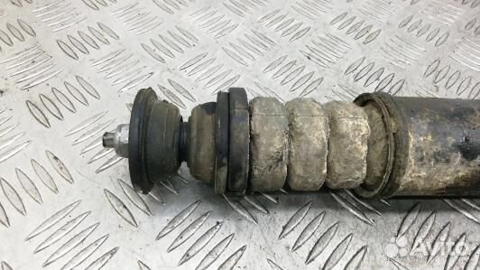 Амортизатор задней балки nissan note E11 (4BN23LX0