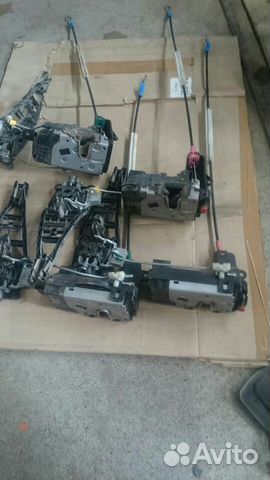 Замок передней левой двери на Опель зафира б