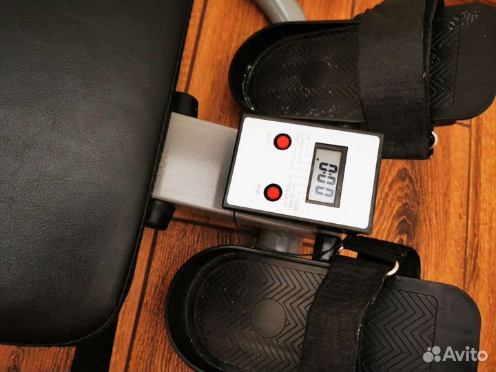 Гребной тренажер