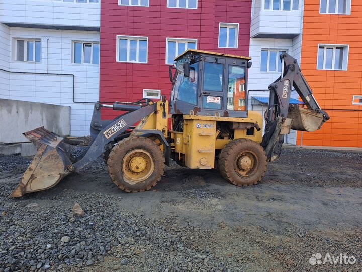 Экскаватор погрузчик