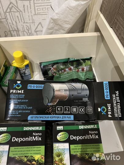 Автоматическая кормушка для рыб