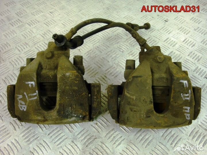 Суппорт тормозной передний Ford Focus 2