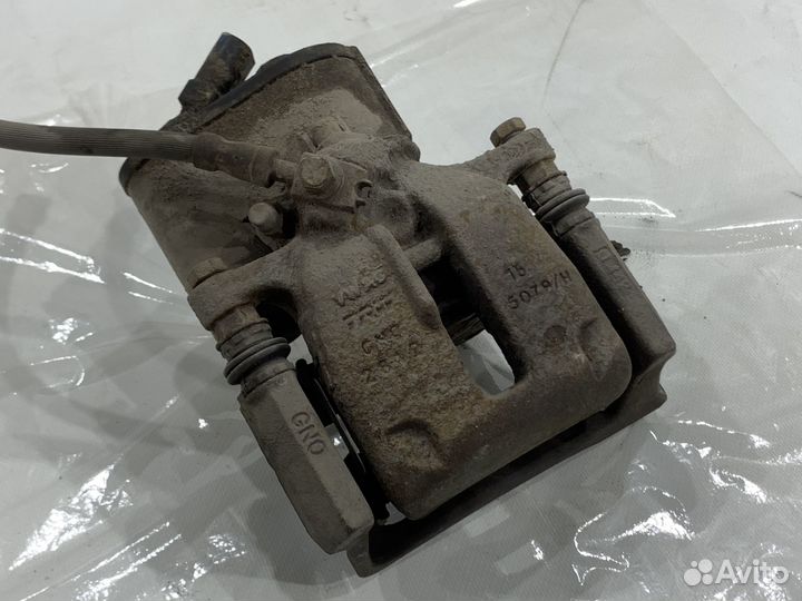 Суппорт тормозной задний правый VAG