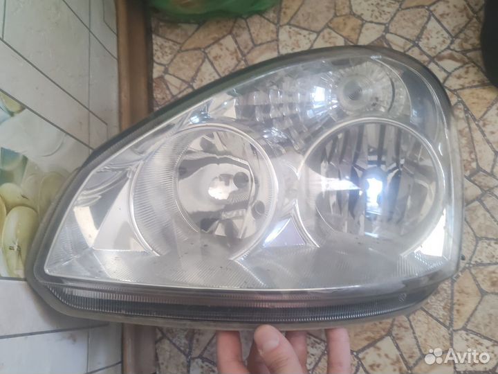 Фара левая priora 1