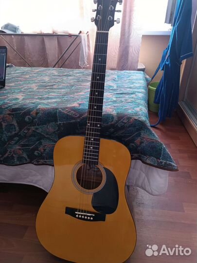 Акустическая гитара