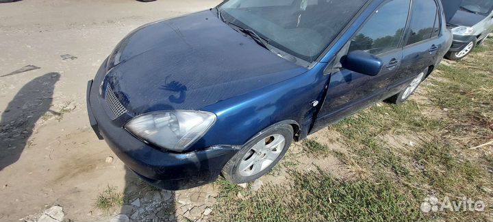 Передняя панель Mitsubishi Lancer 9