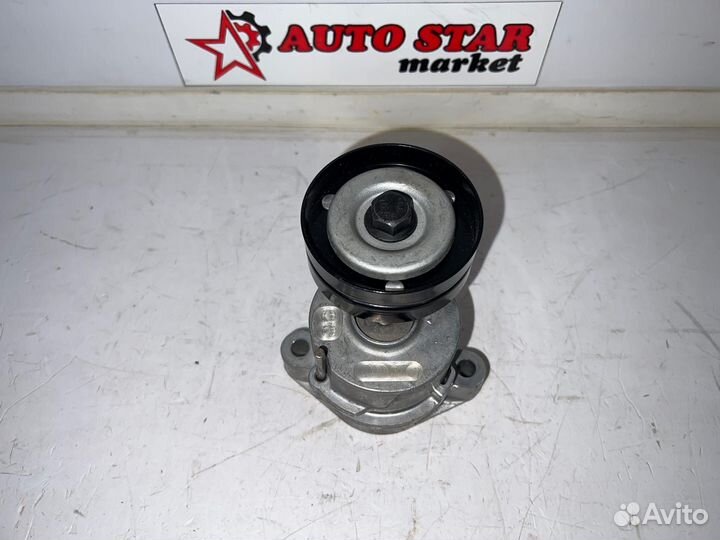 Ролик натяжной в сборе новый Opel Astra F