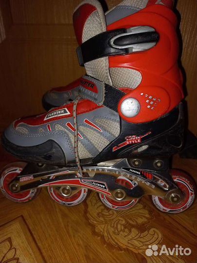 Роликовые коньки