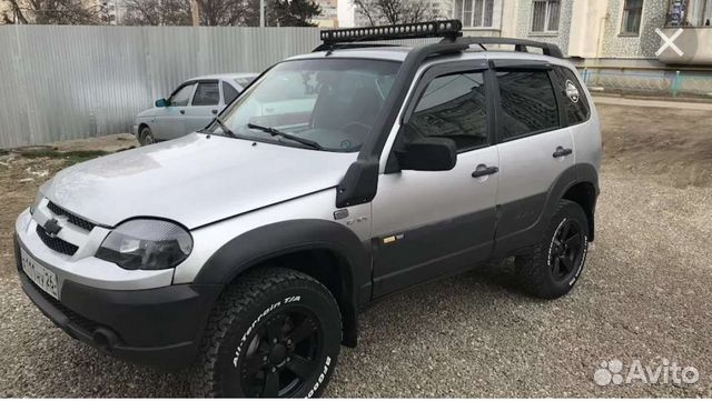 Молдинги на двери Нива Шевроле Бертони