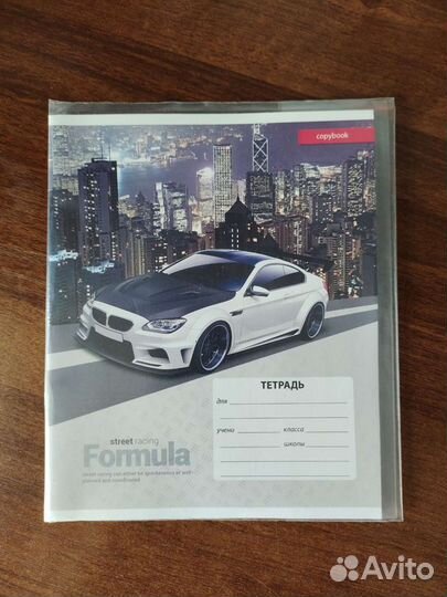 Тетрадь в клетку в обложке