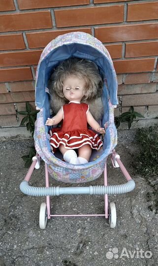 Игрушечная коляска для кукол