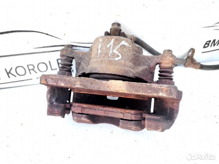 Суппорт передний правый (2001-2007) Suzuki Liana