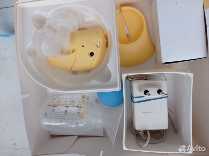 Молокоотсос medela электрический