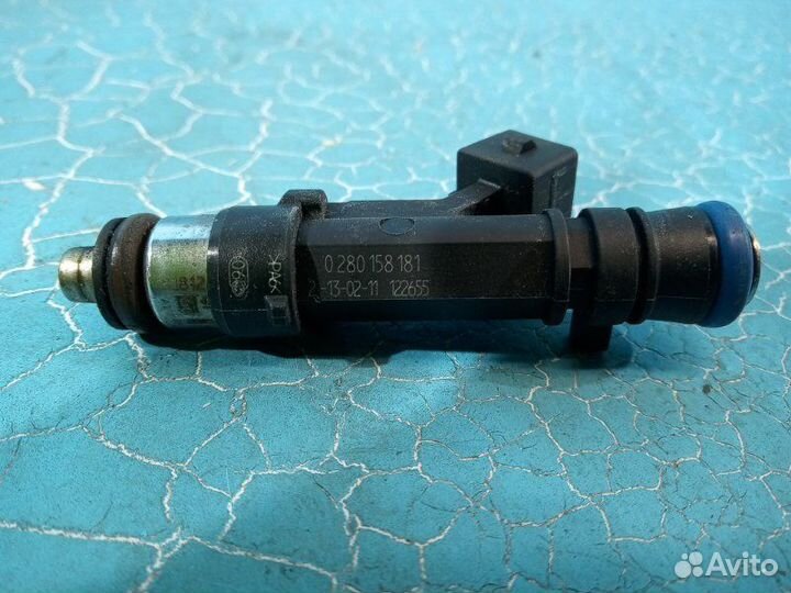 Форсунка топливная Opel Astra J P10 A14XER 2011