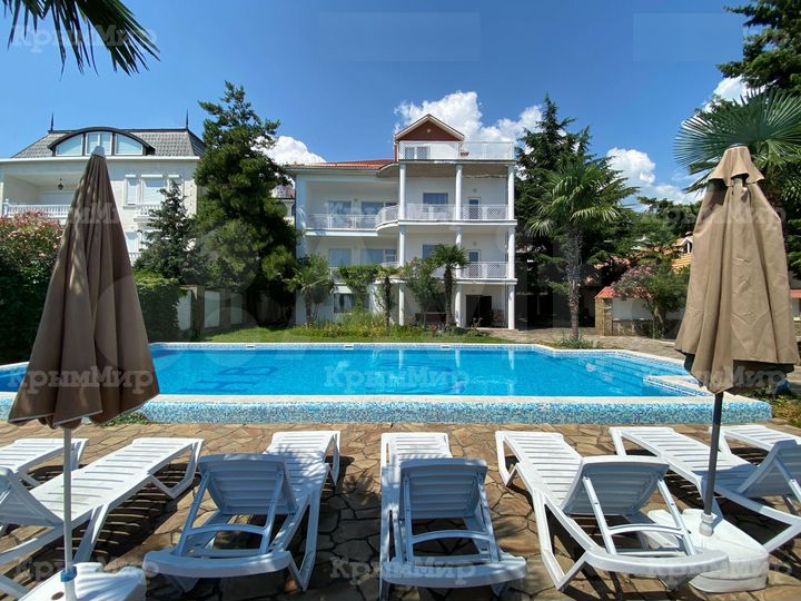 Дом 400 м² на участке 12 сот.