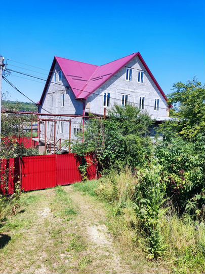 Дом 495 м² на участке 12 сот.