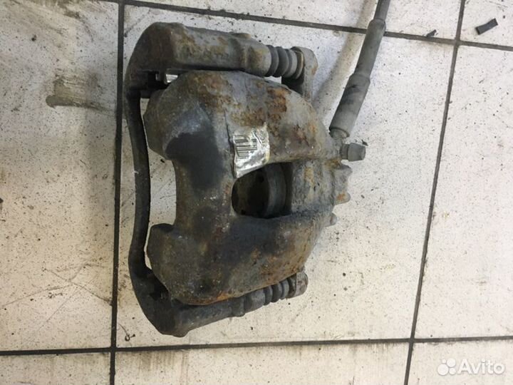 Суппорт тормозной передний левый Peugeot 3008