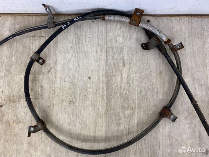 Трос ручника задний левый Mitsubishi Pajero Sport