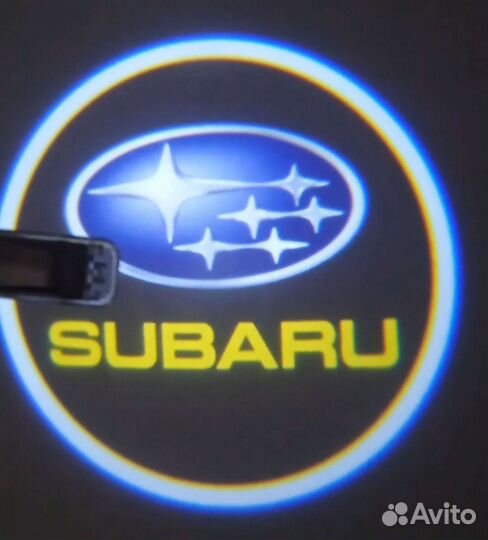 Подсветка в двери с проекцией логотипа Субару пара