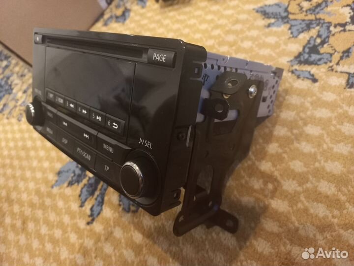 Штатная магнитола с рамкой на Mitsubishi Lancer X