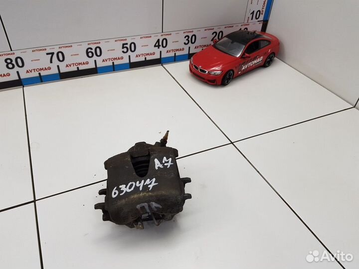 Суппорт передний левый (Skoda Octavia)