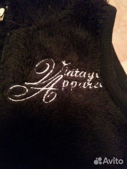 Меховая жилетка