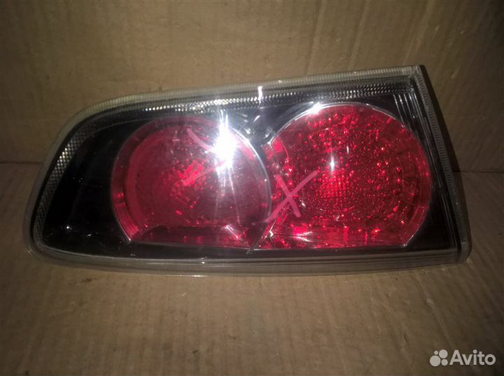 Фонарь левый Mitsubishi Lancer 10 2011