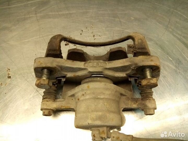 Суппорт передний левый Chevrolet Lacetti J200