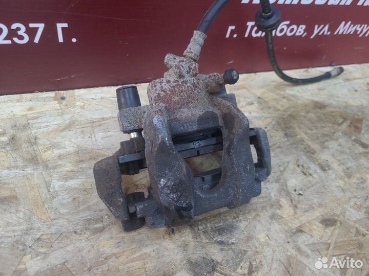 Суппорт тормозной передний левый Renault Logan