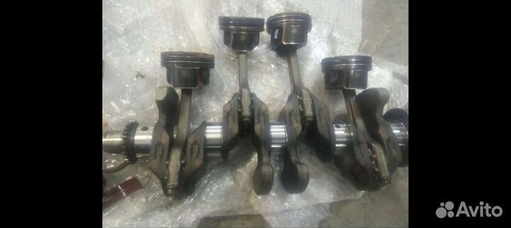 Коленвал в сборе с поршнями