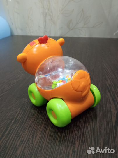 Игрушка-каталка fisher price львёнок