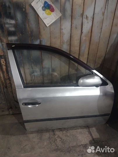 Двери левые skoda octavia тур