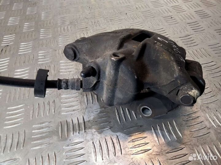 Суппорт передний левый Renault Kangoo